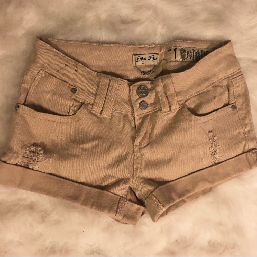 Soft! khaki jean shorts. Distressed detailing.